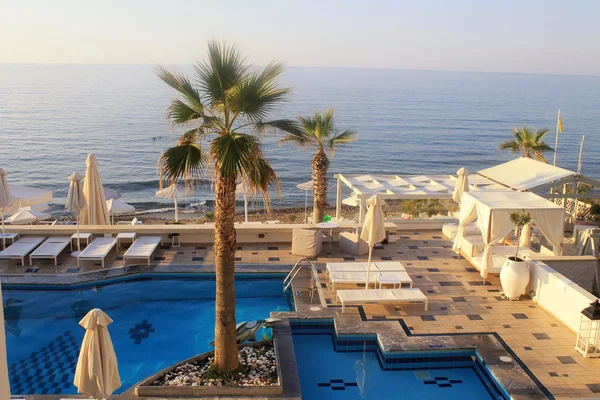 Swimming pool on summer sea resort, Crete, Greece.