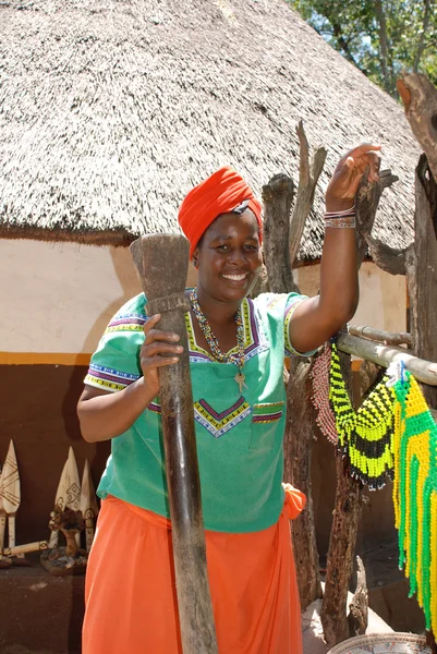 Beautiful black woman in Cultural village Lesedi, South Africa.