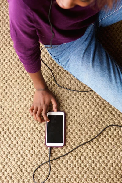 Female hand with mobile phone