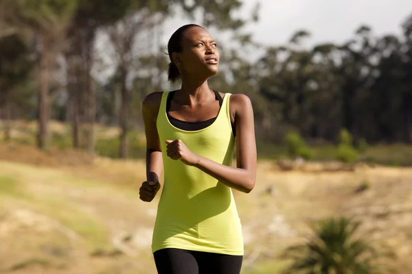Healthy young african woman running