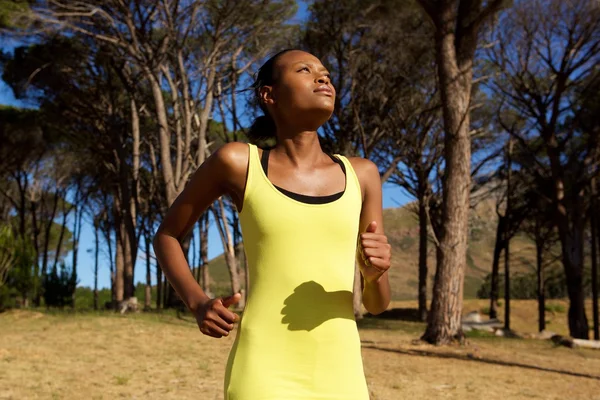 Healthy young african american woman jogging