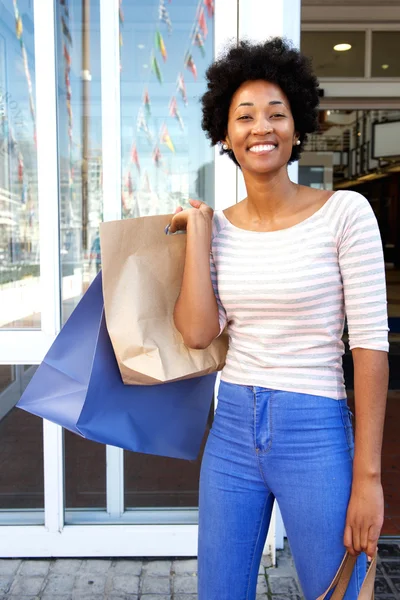 Attractive woman holding bags