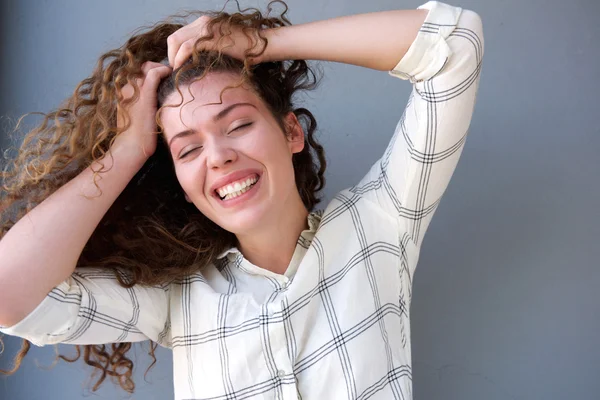 Stressed teen girl with hands in hair