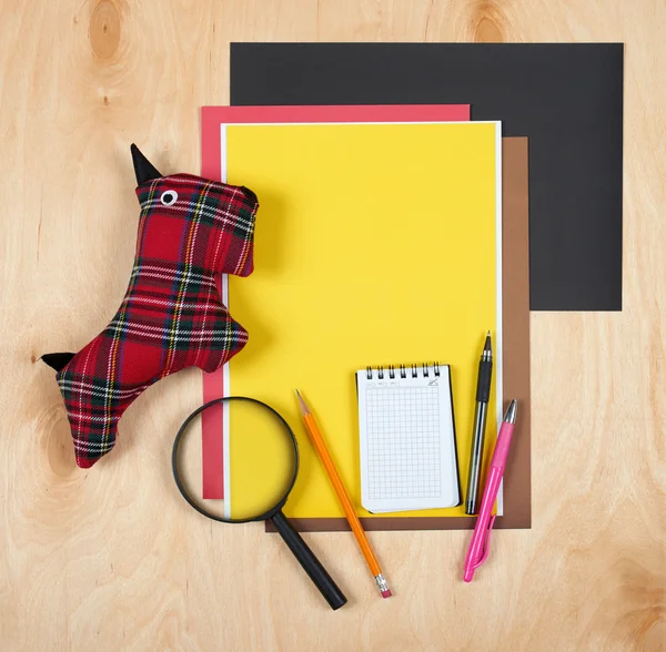 Flat lay office tools and supplies. Stationery on wood background. Flat design of workspace, workplace. Top view of desk background.