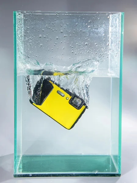 Camera dropped in container water