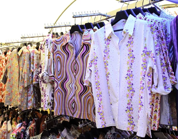 Women shirts on display in the market