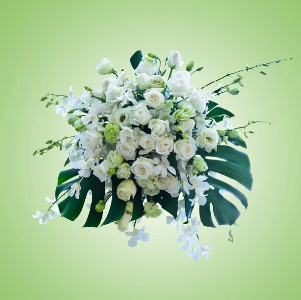 White roses arrangement on green background with working path