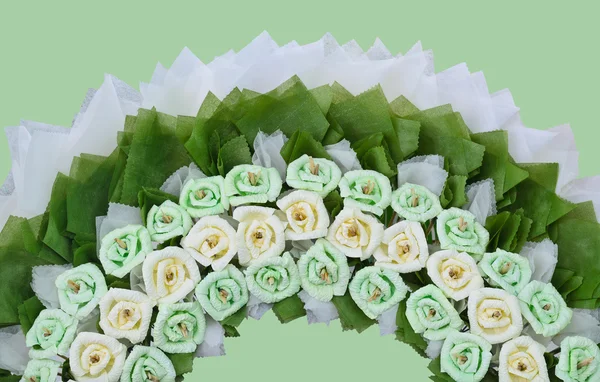 Roses flower wreath for use in Thai funeral on green background