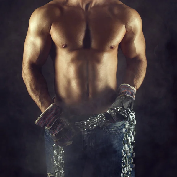 Sexy macho man body with chain