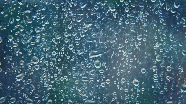 Raindrop on mirror background