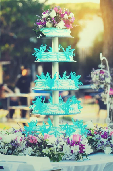 Blue and white wedding cake setting