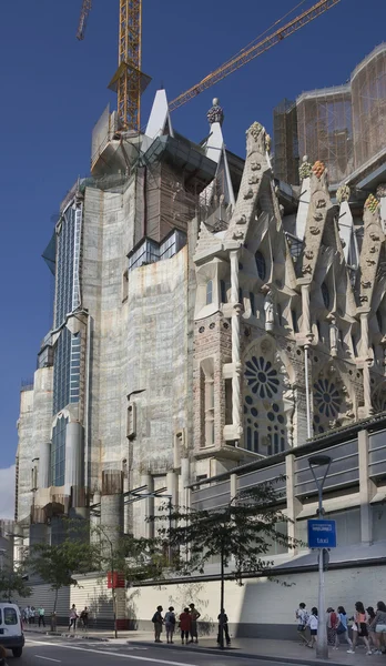 Tourists visiting the Sagrada Familia