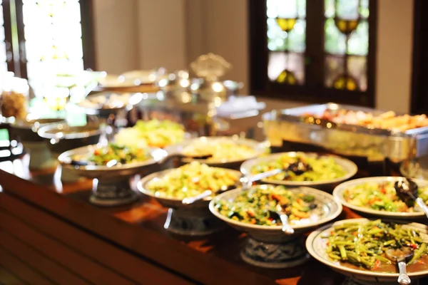 Blurred image breakfast buffet table at hotel restaurant