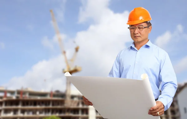 Business engineer at construction site background