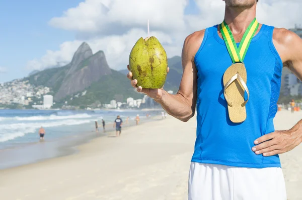 Champion Gold Medal Flip Flop Athlete Celebrating with Coconut Rio