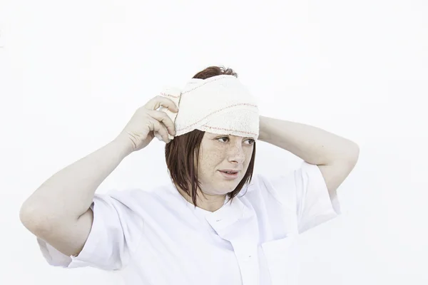 Girl bandaged head