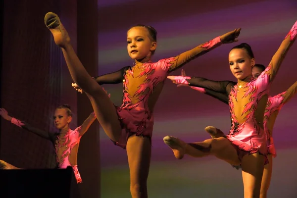 Nadym, Russia - 7 December 2012: Unknown girls gymnasts perform