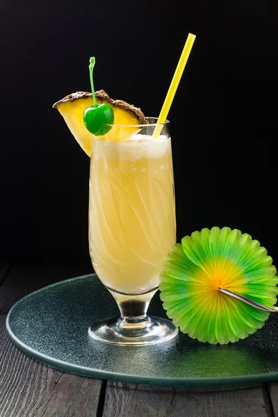 Refreshing pineapple cocktail with coconut cream