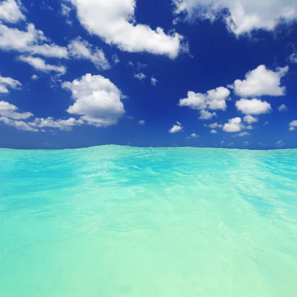Clear blue water under sky