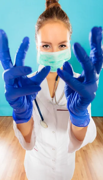 Woman in face surgical mask