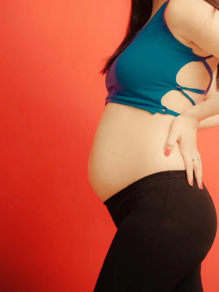 Tummy of pregnant woman