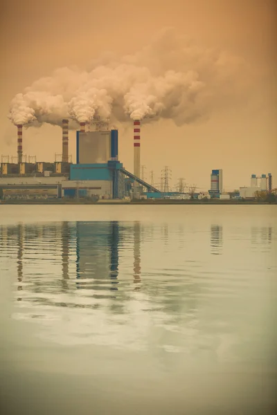 Smoke from chimney of power plant or station. Industry