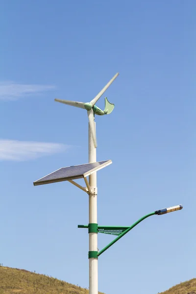 Street lamp post with solar panel and wind turbine in China.