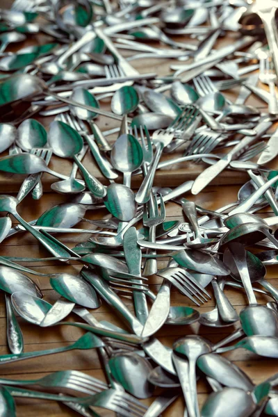 Heap of spoons, forks and knives