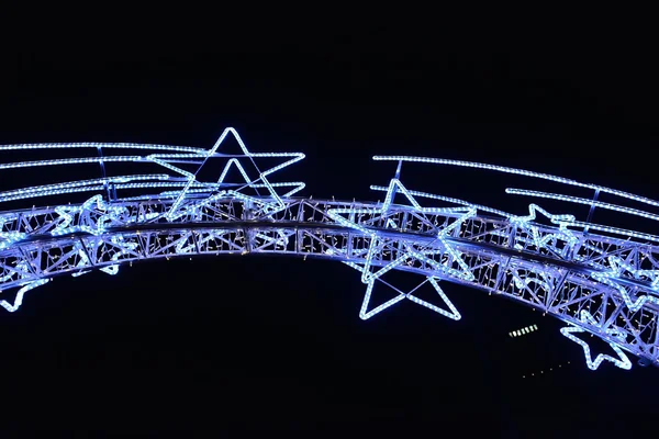 Illumination of entry to traditional German Christmas Market in historical center of Leipzig