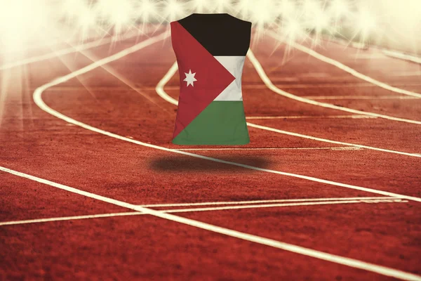 Red running track with lines and Jordan flag on shirt