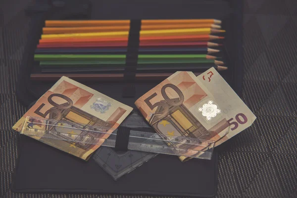 Expensive school theme, pencil case with euro money