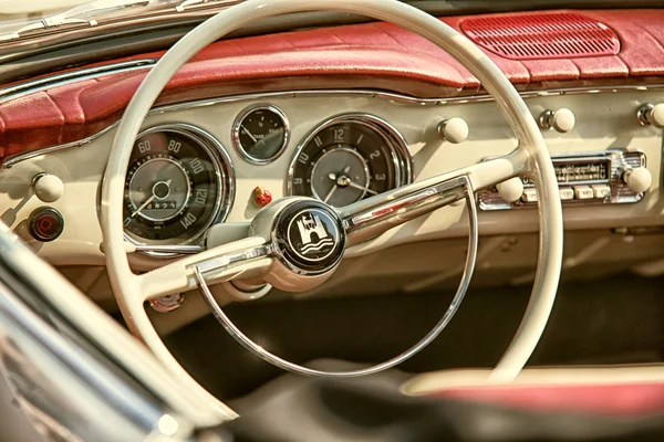 Sleza, Poland, August 15, 2015: Close up on  vintage car steering wheel and kockpit on  Motorclassic show on August 15, 2015 in the Poland
