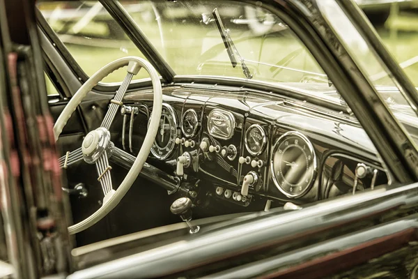 Sleza, Poland, August 15, 2015: Close up on vintage car steering wheel and kockpit on  Motorclassic show on August 15, 2015 in the Poland