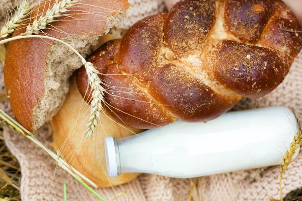 Bottle of milk and bread