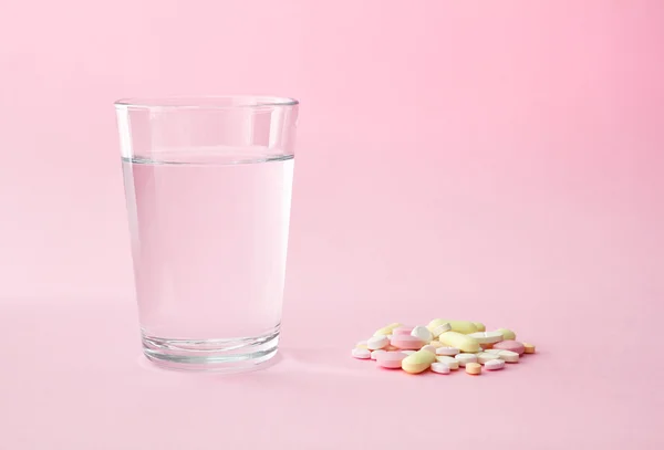 Pills and glass of water