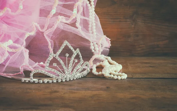 Wedding vintage crown of bride, pearls and pink veil. wedding concept. vintage filtered. selective focus. vintage filtered