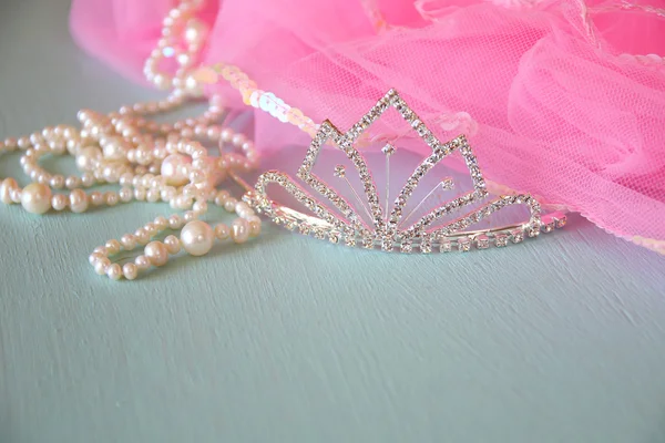 Wedding vintage crown of bride, pearls and pink veil. wedding concept. vintage filtered. selective focus