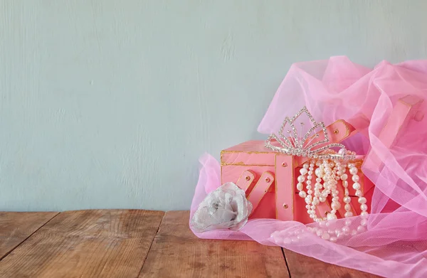 Wedding vintage crown of bride, pearls and pink veil. wedding concept. selective focus. vintage filtered