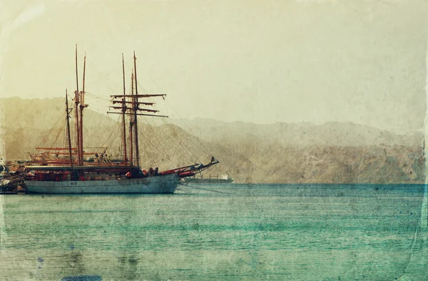 Abstract image of the yacht at sea. Old style photo