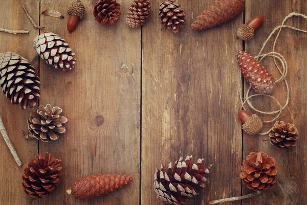 Pine cones on rustic background