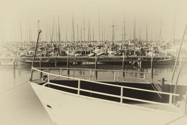 Romantic marina with yachts. retro old style filtered image