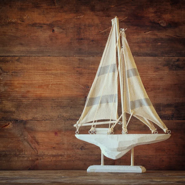 Wooden white sailing boat
