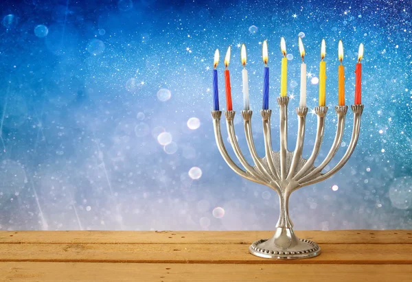 Image of jewish holiday Hanukkah with menorah (traditional Candelabra).