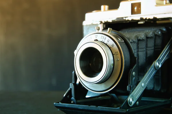 Old camera on table