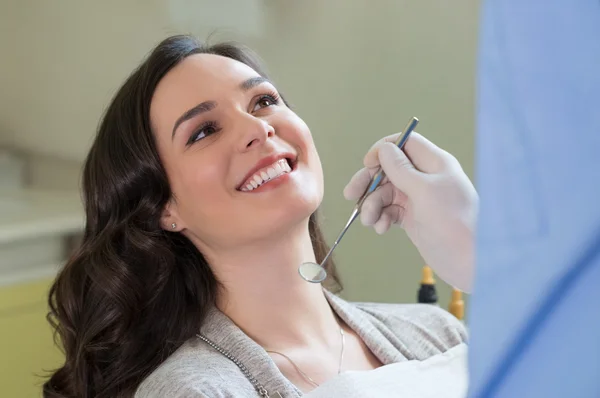 Young woman at dentist room