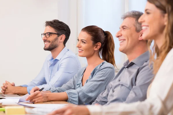 Businesspeople during a seminar