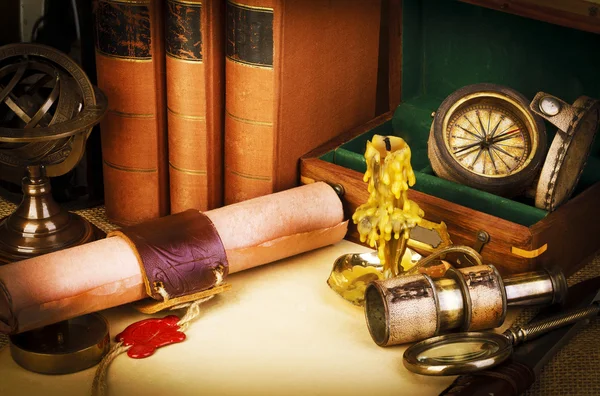 Old books, candle, spyglass, old scroll with red wax seal, vintage compass. Adventure stories background. Retro style.