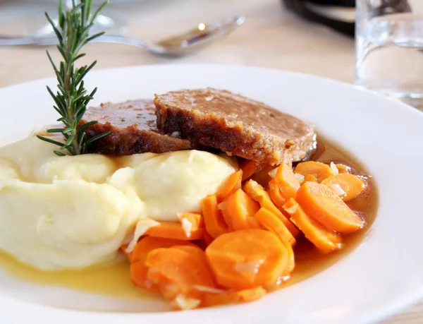 Swiss Food - minced meat steak with potato puree and carrots