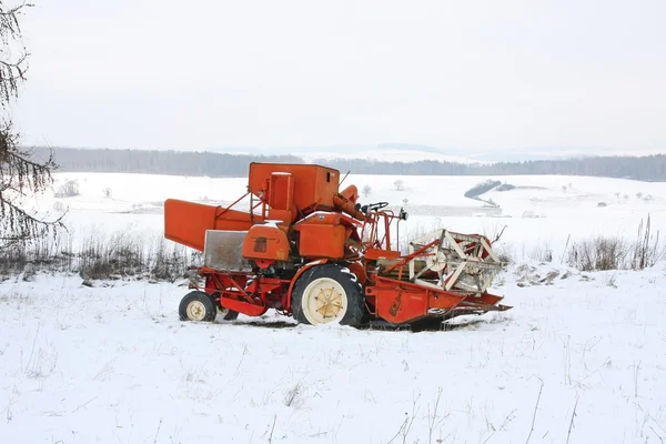 Agricultural machine in winter field