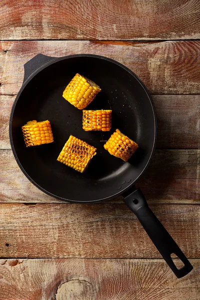 Pan Fried Corn on Rustic Wooden Table